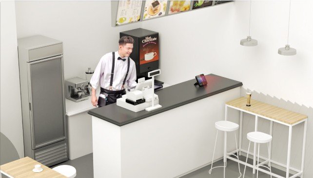 Face recognition terminal in use at a small cafe counter